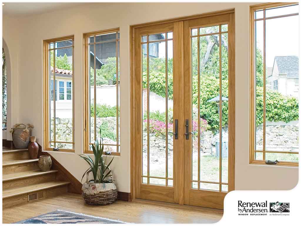 Patio Doors Waukesha WI Interior of home with wood flooring, steps leading to second floor, and a pair of Frenchwood patio doors.